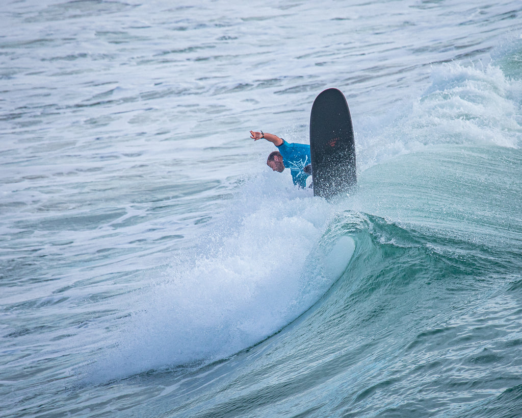 What moves can you do on a longboard surfboard?